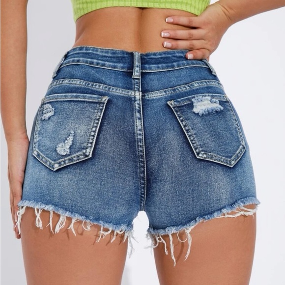 SHEIN Essnce Ripped Raw Trim Denim Shorts in Medium Wash - Picture 5 of 11